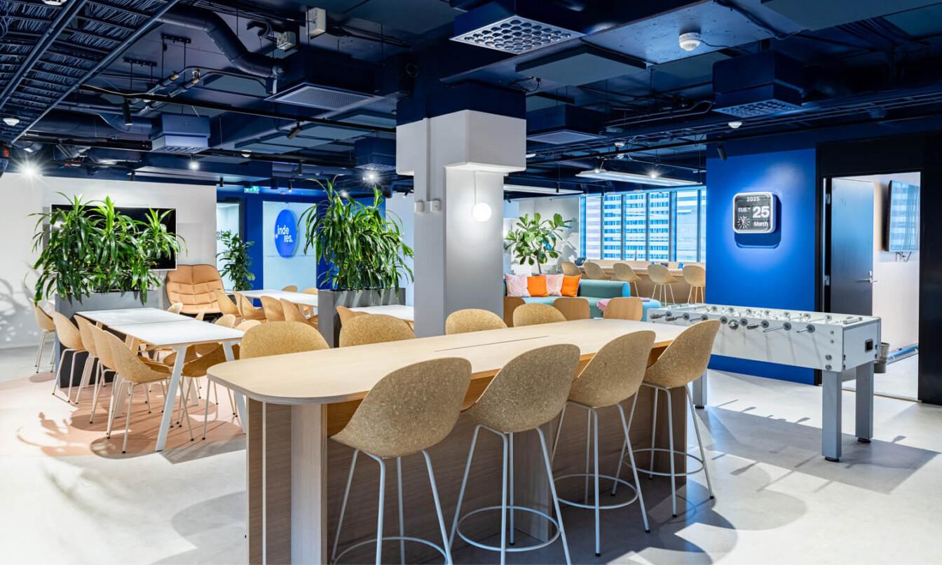 A blue and beige toned office common area.