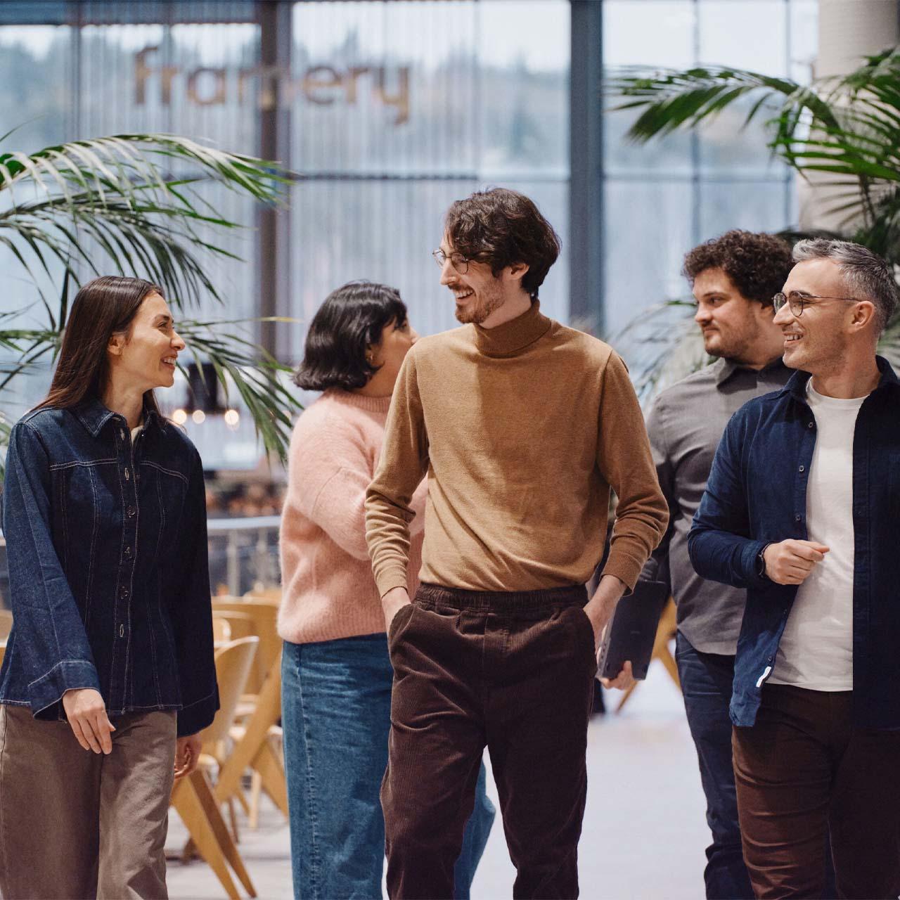 Framerians walking together at the Framery headquarters.