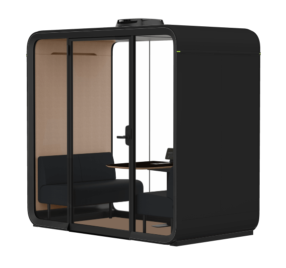 A compact, modern office booth with glass doors, featuring a small table and seating inside, designed for private work or meetings.
