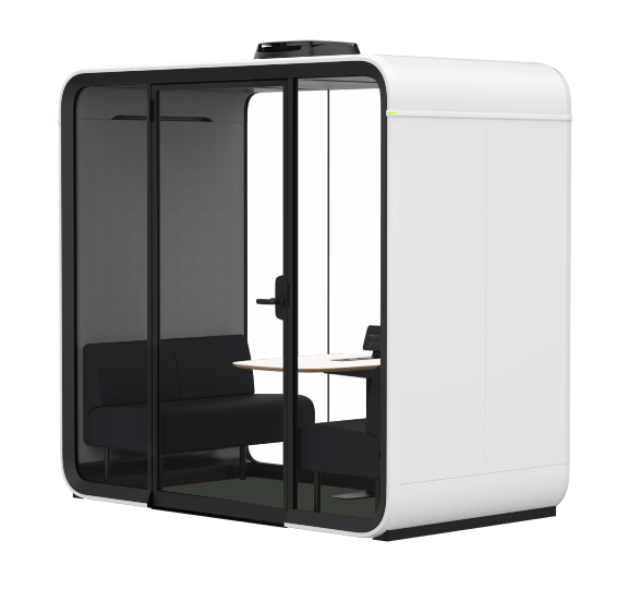 A modern, white soundproof office pod with glass doors, featuring a bench and small table inside, designed for private meetings or work sessions.